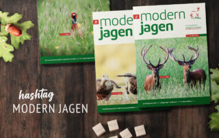 3 Cover des Mitteilungsblattes #modernjagen auf Holztisch